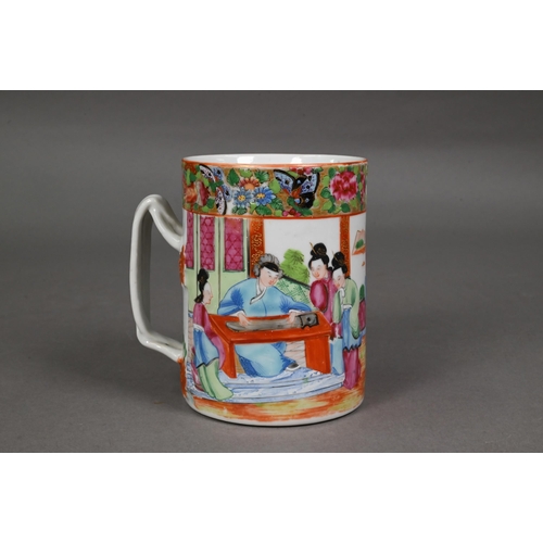 440 - A late 19th century Chinese famille rose tankard entwinned strap handle, the exterior painted in pol... 