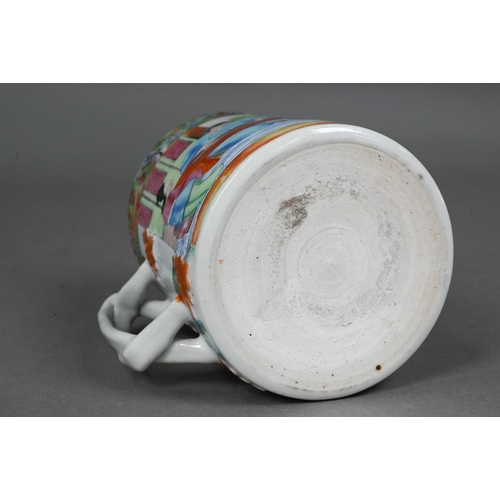 440 - A late 19th century Chinese famille rose tankard entwinned strap handle, the exterior painted in pol... 