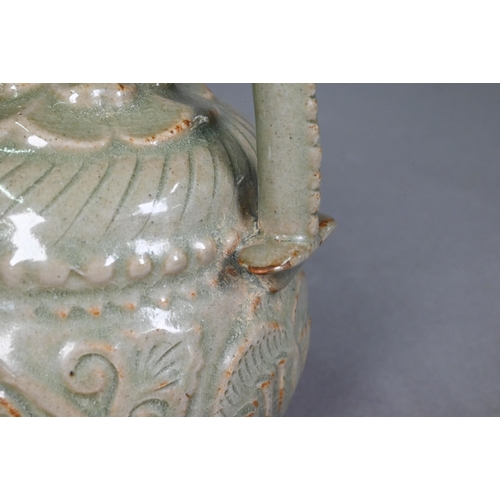 442 - A Chinese Yaozhou celadon cadogan teapot or wine pot in the Northern Sony dynasty style, with moulde... 