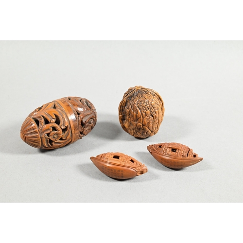 451 - Four Chinese carved fruit pit or fruit stone items, Guangdong province, including two boat carvings ... 