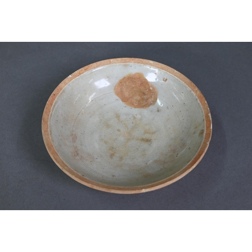 454 - A Chinese Qingbai shallow bowl, Song Dynasty, the exterior with incised lotus decoration and plain i... 