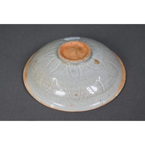 454 - A Chinese Qingbai shallow bowl, Song Dynasty, the exterior with incised lotus decoration and plain i... 