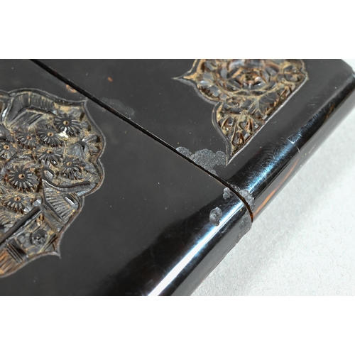 455 - A 19th century Chinese Canton tortoiseshell card-case carved with floral designs around the central ... 