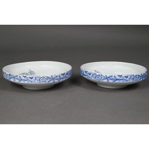 464 - A pair of Japanese Arita blue and white bowls, Taisho/Showa period, the interiors painted in undergl... 