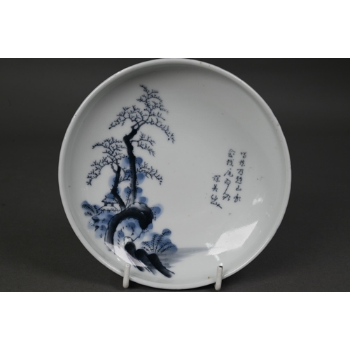 464 - A pair of Japanese Arita blue and white bowls, Taisho/Showa period, the interiors painted in undergl... 