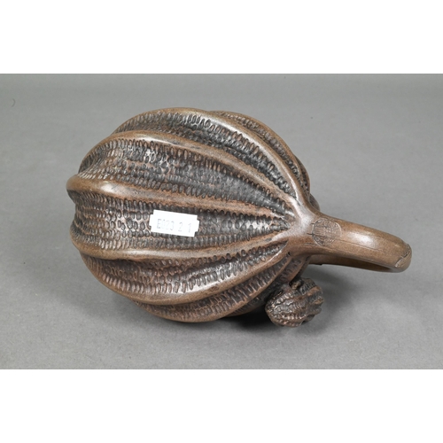 474 - A Chinese naturalistic Yixing teapot and cover with mouse finial and looping vine handle, the body a... 