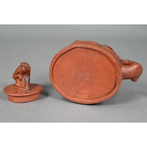 476 - A Chinese Yixing gloular lotus leaf teapot and cover with frog finial 18 cm w x 10 cm h to/w another... 