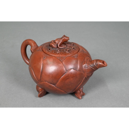 476 - A Chinese Yixing gloular lotus leaf teapot and cover with frog finial 18 cm w x 10 cm h to/w another... 