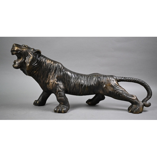 477 - A large 20th century bronze figure of a fierce prowling tiger in the Japanese manner, unsigned, 45 c... 