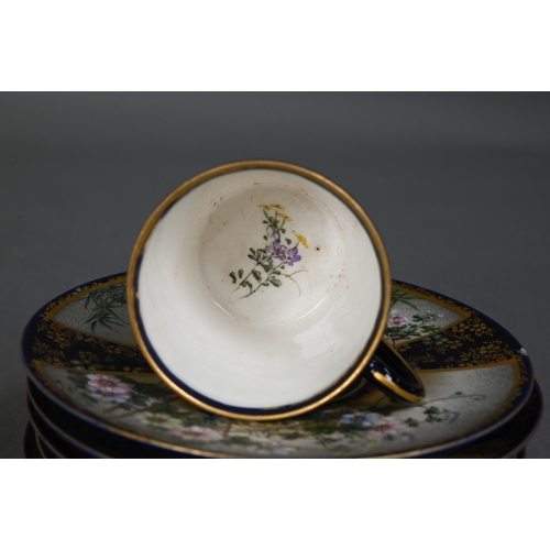 481 - An early 20th century Japanese Satsuma part coffee service gilded and painted with Fuji landscapes a... 