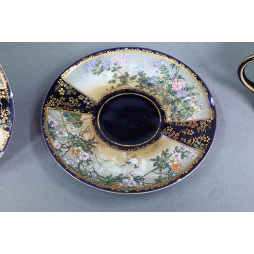 481 - An early 20th century Japanese Satsuma part coffee service gilded and painted with Fuji landscapes a... 