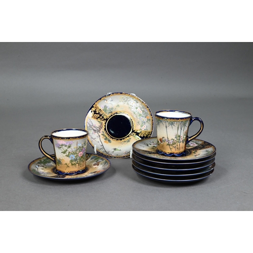 481 - An early 20th century Japanese Satsuma part coffee service gilded and painted with Fuji landscapes a... 