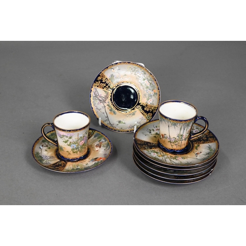 481 - An early 20th century Japanese Satsuma part coffee service gilded and painted with Fuji landscapes a... 