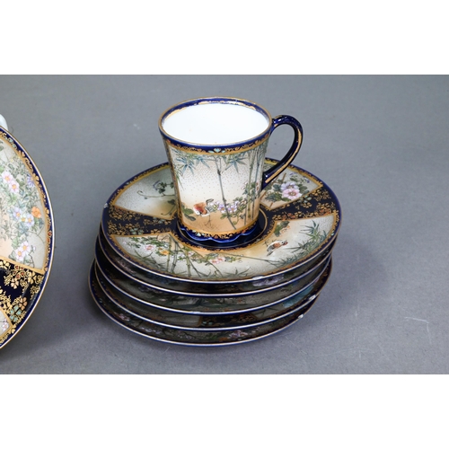 481 - An early 20th century Japanese Satsuma part coffee service gilded and painted with Fuji landscapes a... 