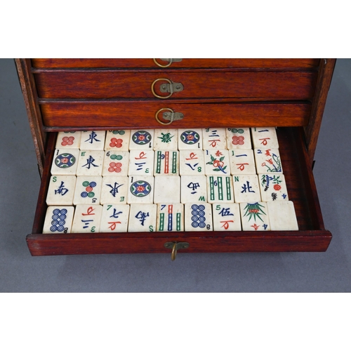 482 - A Chinese Mah Jong set, the hardwood brass mounted case having two brass handles and sliding front p... 