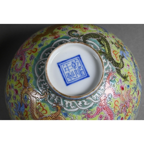 487 - Two 20th century Chinese egg-shell porcelain bowls painted interiors with phoenix and feather-scroll... 