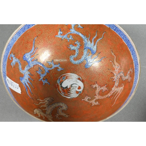 487 - Two 20th century Chinese egg-shell porcelain bowls painted interiors with phoenix and feather-scroll... 