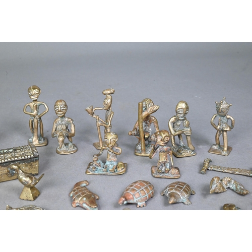 Five Chinese or Burmese bronze mythical beast opium weights, all