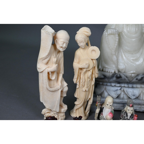 495 - A large Chinese carved alabaster figure (the bodhisattva of compassion) Guanyin seated upon a carved... 