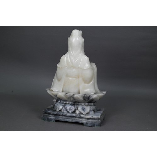 495 - A large Chinese carved alabaster figure (the bodhisattva of compassion) Guanyin seated upon a carved... 