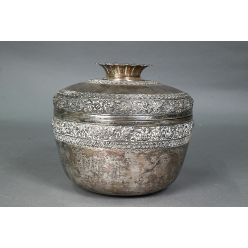 508 - A South East Asian silver stem bowl and cover with lotus bud finial, profusely embossed and engraved... 