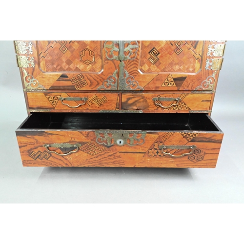 514 - An early 20th century Japanese hardwood, possibly zelkova and marquetry ledger chest (Choba Dansu) f... 