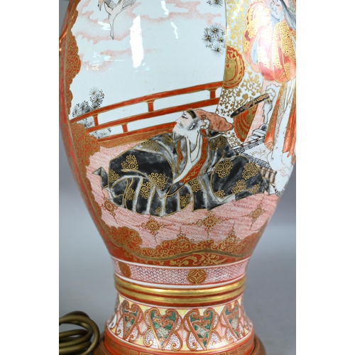 515 - A late 19th century Japanese Kutani vase (now lamp mounted) with mythical beast mask handles, painte... 