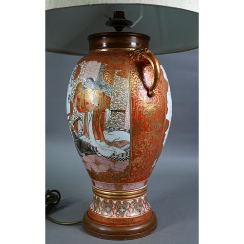 515 - A late 19th century Japanese Kutani vase (now lamp mounted) with mythical beast mask handles, painte... 