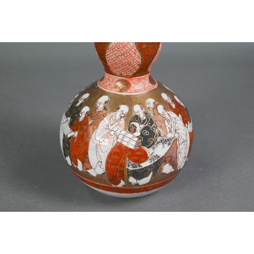 517 - A 19th century Japnese Kutani double gourd vase painted with Rakan studying scrolls, 22 cm high, a p... 