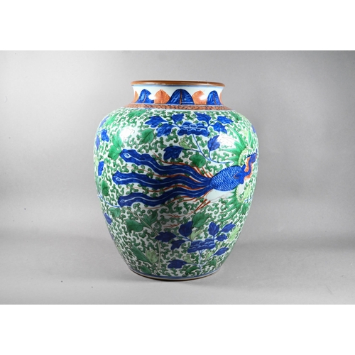 520 - A large Chinese wucai vase, late Qing, painted in underglaze blue, copper red and polychrome enamels... 