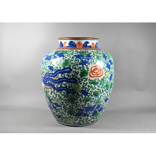 520 - A large Chinese wucai vase, late Qing, painted in underglaze blue, copper red and polychrome enamels... 