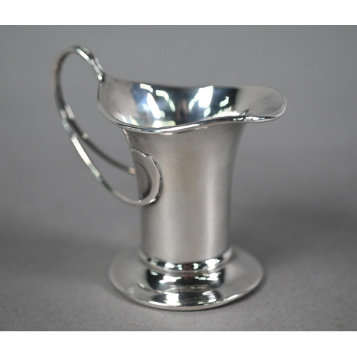 78 - Edwardian Art Nouveau silver cream jug with organic whiplash handle and flared spout and foot-rim, G... 