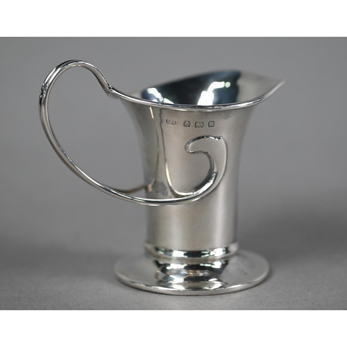 78 - Edwardian Art Nouveau silver cream jug with organic whiplash handle and flared spout and foot-rim, G... 