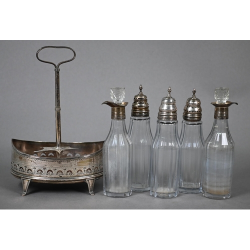 80 - George III oval silver cruet with wooden platform, engraved and pierced sides and scroll feet, centr... 