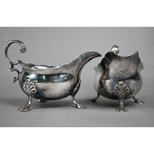 98 - Pair of George III silver pot-bellied sauce-boats with scroll handles and shell feet, Fuller White, ... 