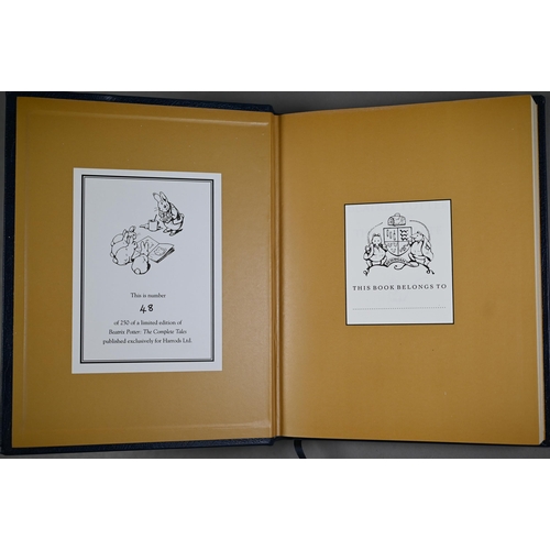 1014 - Two ltd ed leather-bound volumes published for Harrods, Winnie the Pooh the Complete Collection of S... 