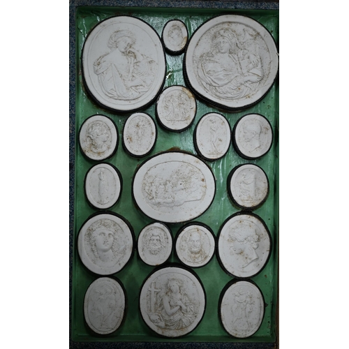 1116 - Two early 19th century Grand Tour sets of cast plaster classical relief plaques, in book-form cases ... 