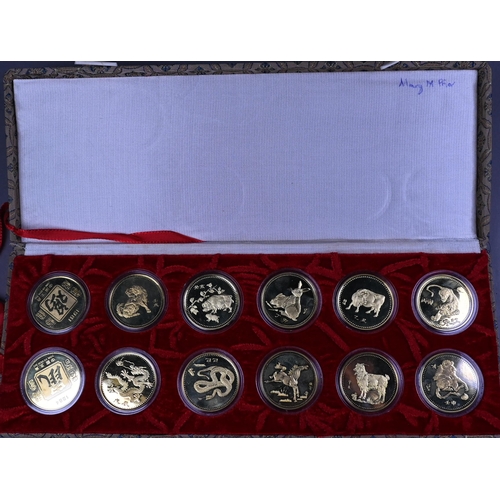 1147 - A boxed set of twelve Chinese Zodiac gilt coins in proof-cases, each 32mm diam