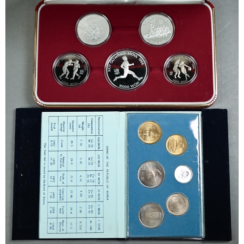 1154 - Cased set of five 1988 Seoul Olympics commemorative coins including three sterling silver coins to/w... 