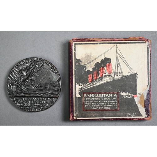 1156 - Replica 'Lusitania' medal - boxed with French explanatory pamphlet to/w a miniature carved wood 'sho... 