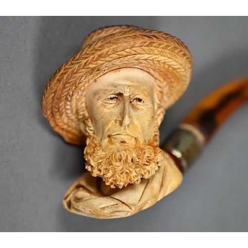 1169 - Edwardian Meerschaum pipe, carved as a bearded gentleman in a straw hat, on silver-mounted amber ste... 