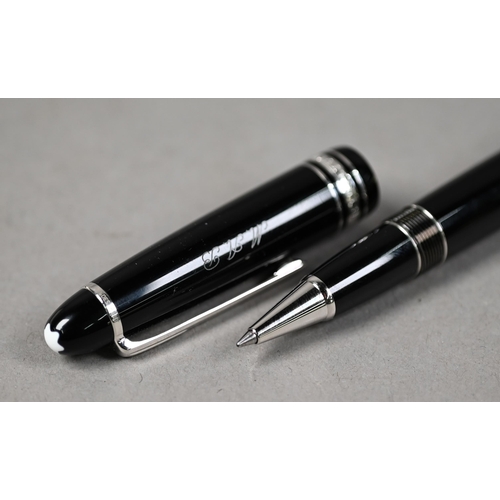 1177 - A Montblanc Meisterstuck Pix luxury rollerball pen, midsize height 14.4 cm, black precious resin scr... 