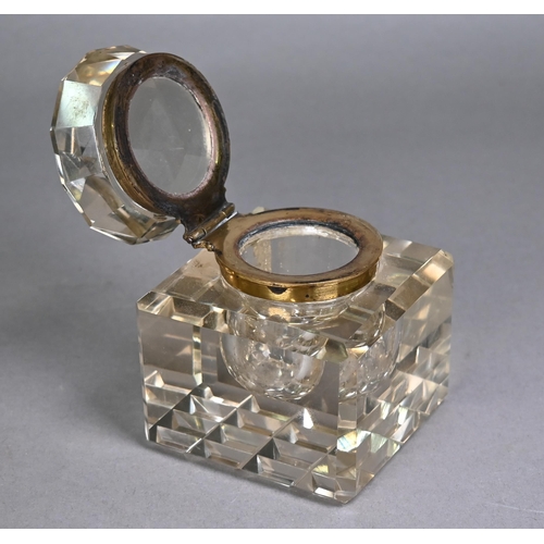 1182 - Heavy cut glass inkwell with gilt brass hinged collar, 9cm square