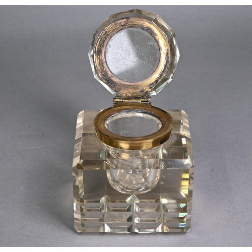 1182 - Heavy cut glass inkwell with gilt brass hinged collar, 9cm square