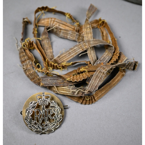 1198 - Two vintage tin helmets with liners to/w a tin containing assorted anchor branded tunic buttons and ... 