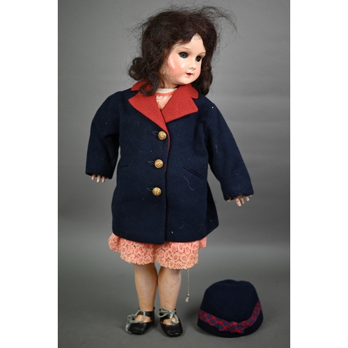 1204 - A 1920s composite girl-doll, dressed in tailored Naval jacket. 59 cm 