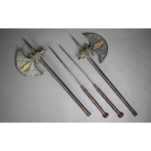 1209 - Pair of antique Indian steel axes with brass-mounted crescent blades and daggers concealed in the ha... 