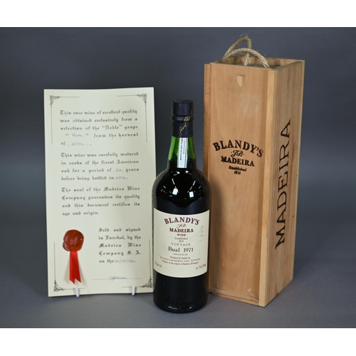 1240 - Nine bottles of Warre's 1991 vintage port (bottled 1993), to/w a bottle of Blandy's Maderia Bual 197... 