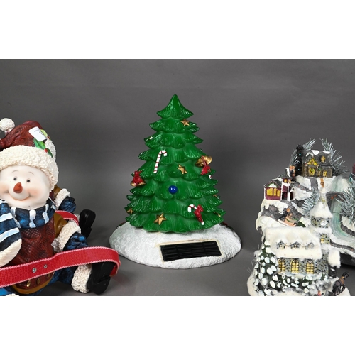 1250 - Six various modern decorative Christmas arrangements, including tree, snowman, villages etc