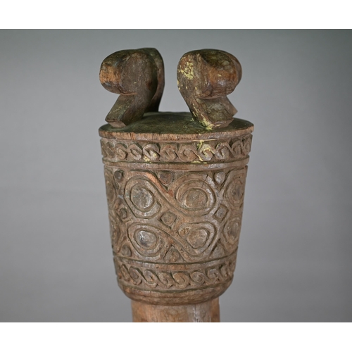 1271 - An Oceanic carved wood tribal pillar or sceptre, the stylised birds' heads and scroll decoration rep... 